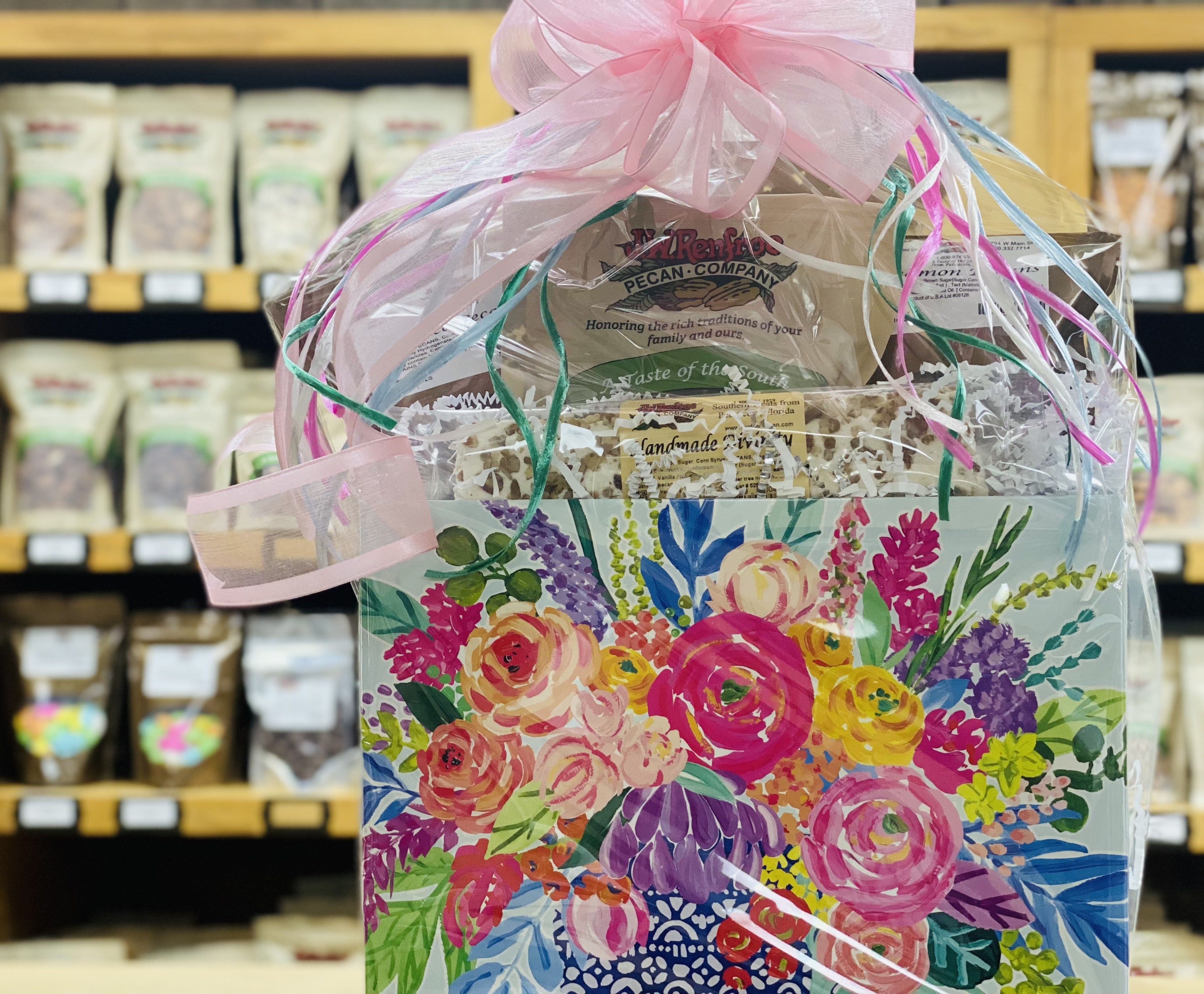Decorative gift bag filled with gourmet nut products - REnfroe Pecan Co, Pensacola FL