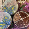 Decorative tin with four compartments filled with gourmet pecan treats - Renfroe Pecan Co, Pensacola FL